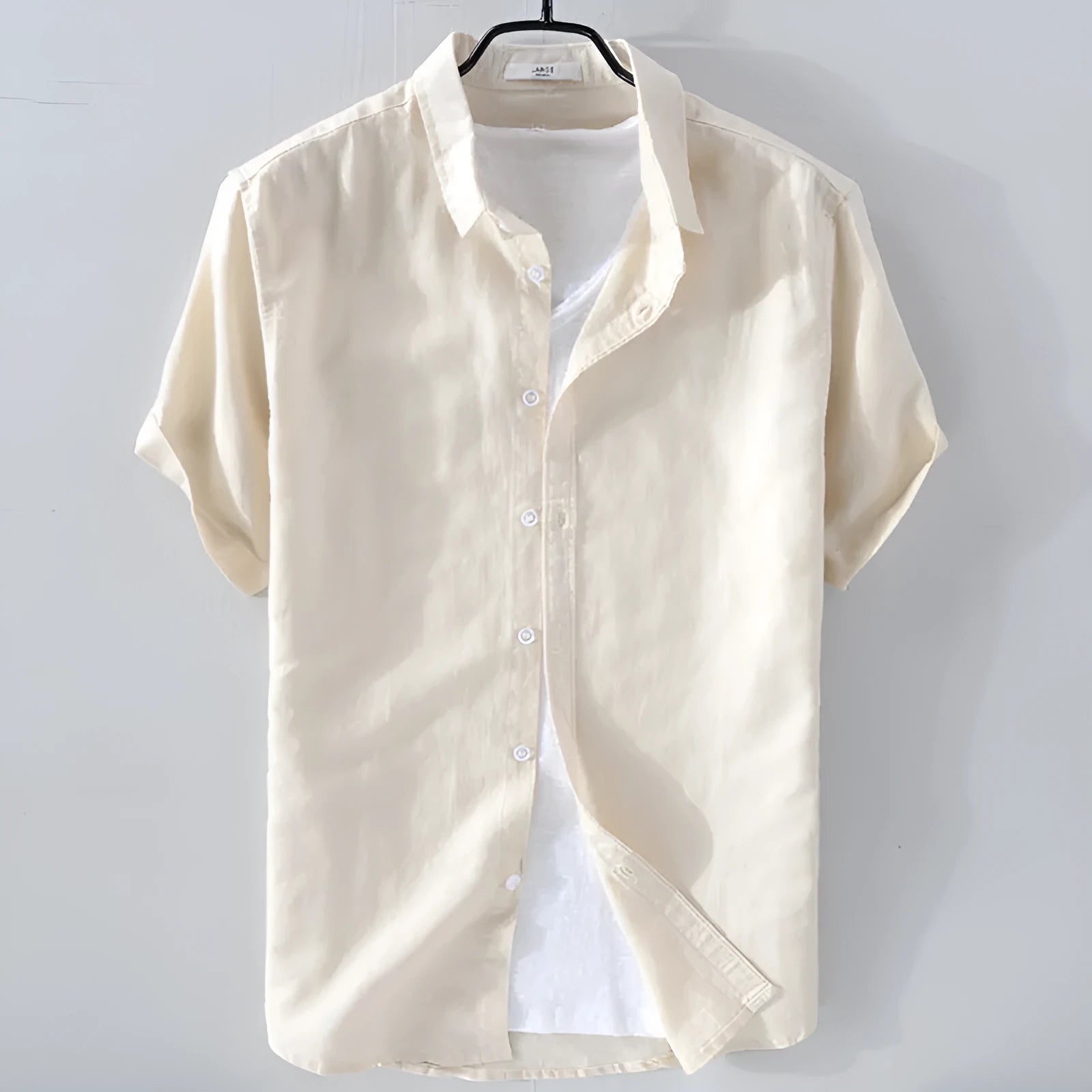 Men's light blue linen blend short sleeve shirt with loose fit on hanger