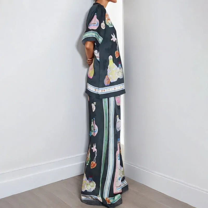 Black women's casual two-piece set with cartoon pattern cardigan and plain trousers