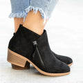 Women's suede ankle boot with side zip, chunky heel, in beige, black, blue, or orange.
