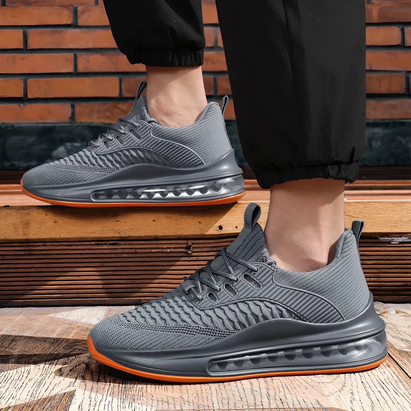 Men's black mesh running shoes with round toe and lace-up front closure