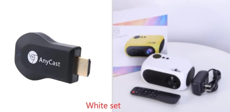 M24 Micro Mini LED Projector in Gold or White colour with power adapter and cables on a table.