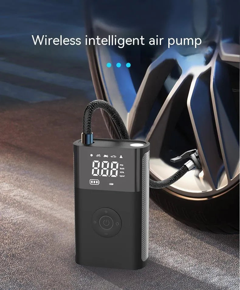 Handheld wireless digital display tyre pump with LED light and multiple nozzle attachments on a white background