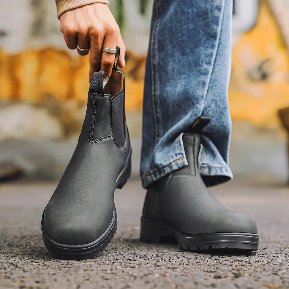 Vintage-style unisex Chelsea boot in frosted brown PU with car suture detail and a low horseshoe heel.