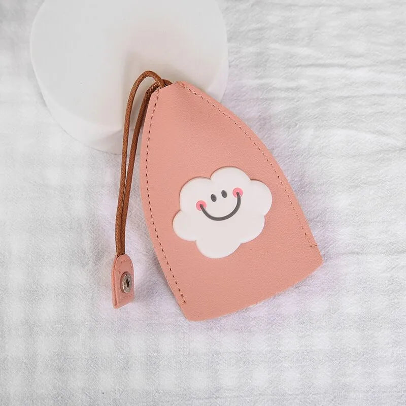 Cartoon design pull-out car key case made from soft PU leather, showing approximate size.