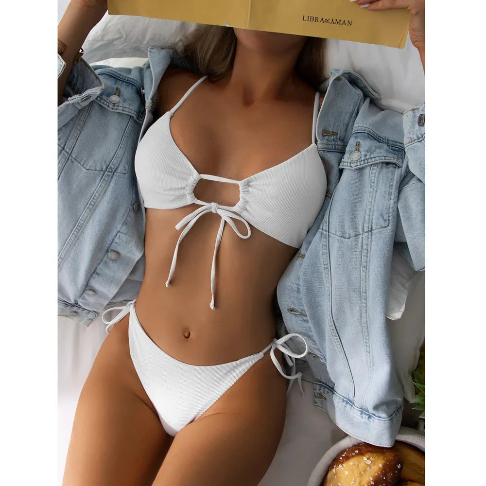 Women's solid colour drawstring bikini swimsuit in quick-dry nylon on a mannequin.