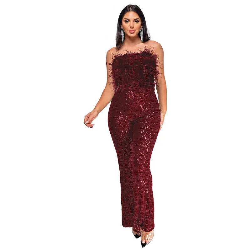 Women's sleeveless backless jumpsuit with flared legs and sequin collar in a selection of colours.