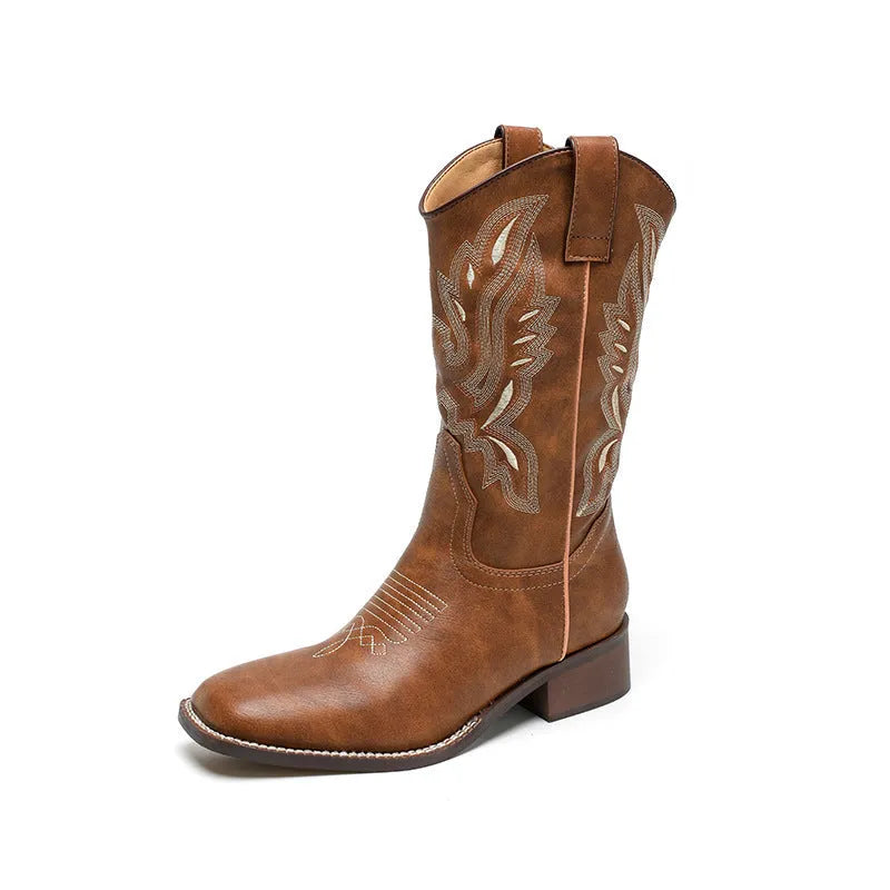 Brown women's mid-calf boots with embroidery detail, round toe, and low square heel.