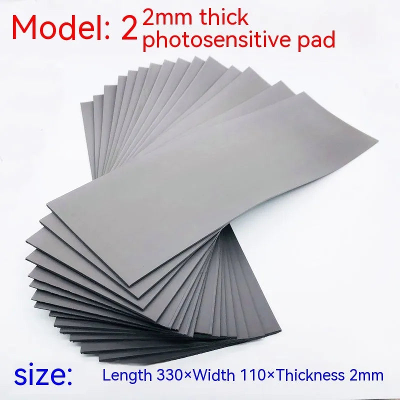 Black and grey plastic photosensitive seal mat for calligraphy and pottery, showing 7mm, 4mm, and 2mm thickness options.
