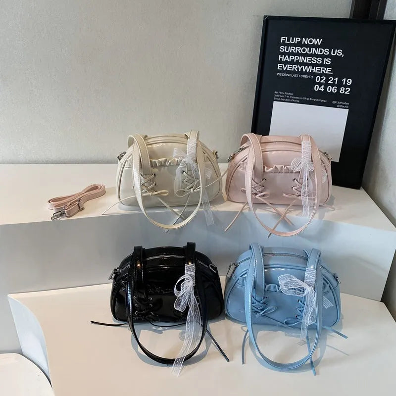 Women's casual PU shoulder handbag with a bandage bow and phone compartment in multiple colour options.