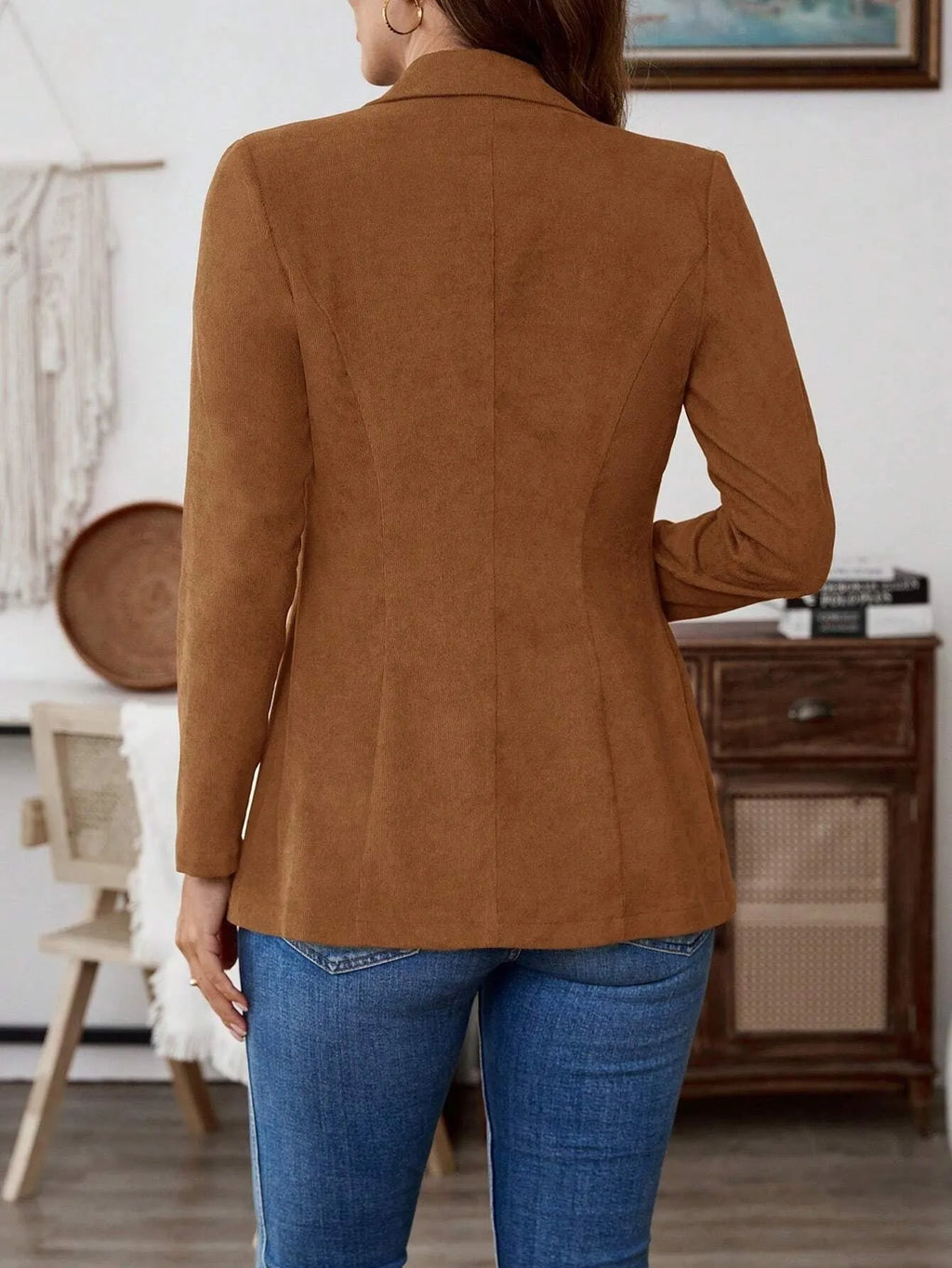 Brown men's single-breasted suit coat with lapel collar and long sleeves.