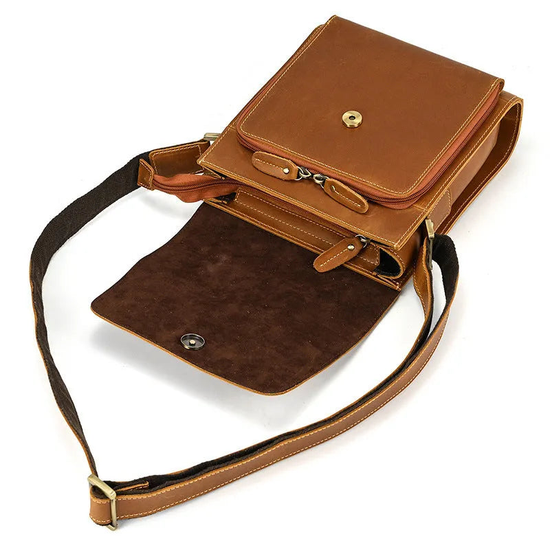 Brown men's leather crossbody shoulder bag with visible stitching and a long strap.