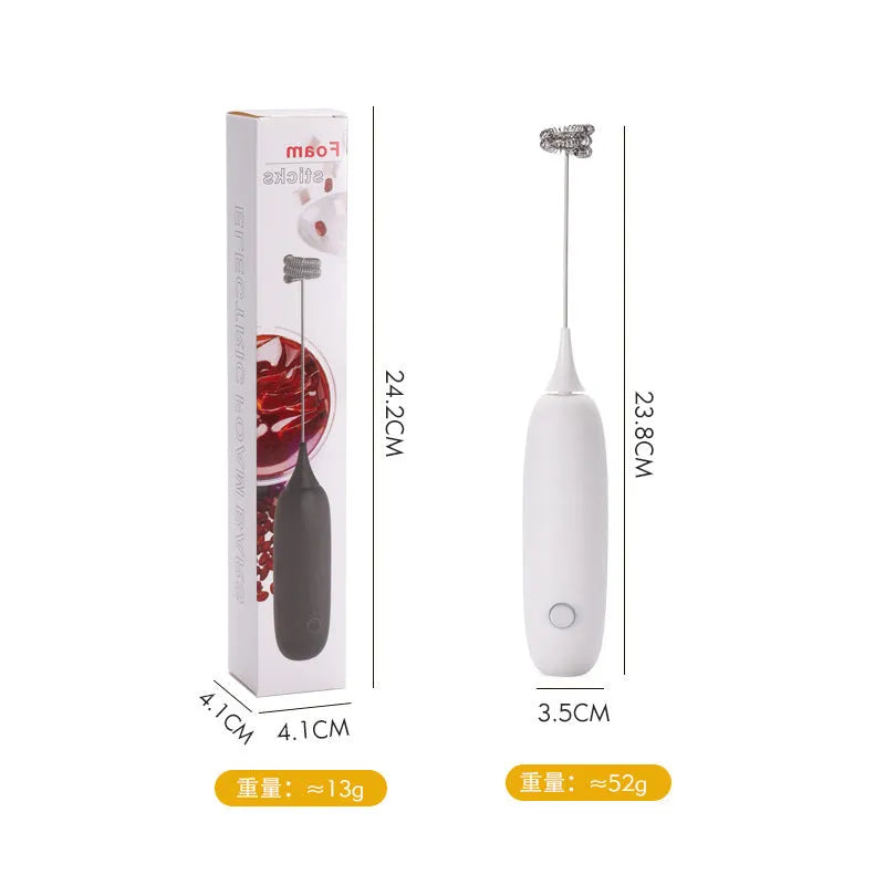 Black and white electric milk frother handheld blender for coffee drinks