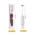 Black and white electric milk frother handheld blender for coffee drinks