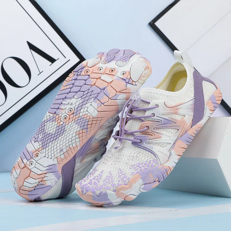 Men's and women's quick-drying mesh beach shoes in various colours with lace-up front and textured rubber sole.
