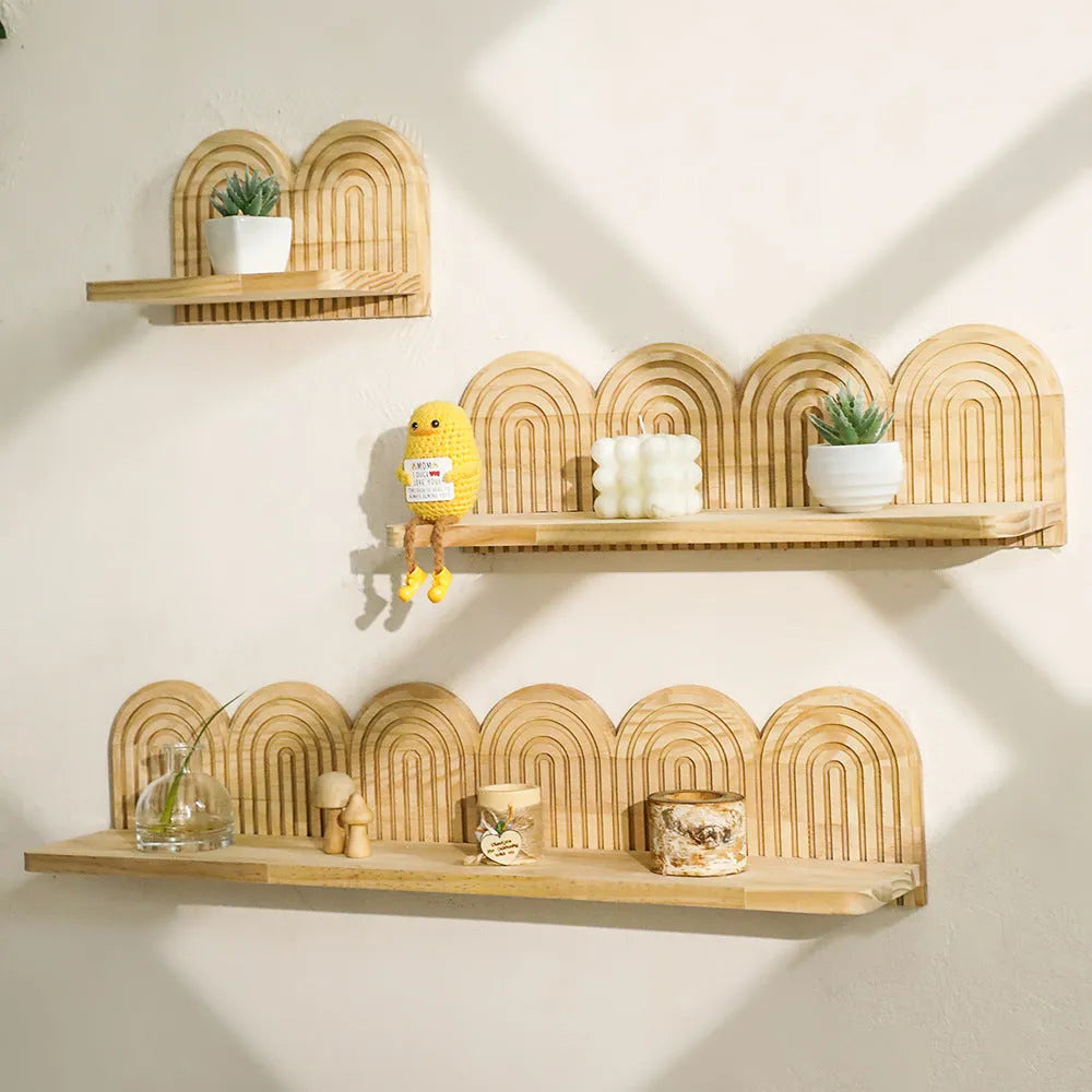 Wooden multi-layer wall rack displaying potted plants in home setting