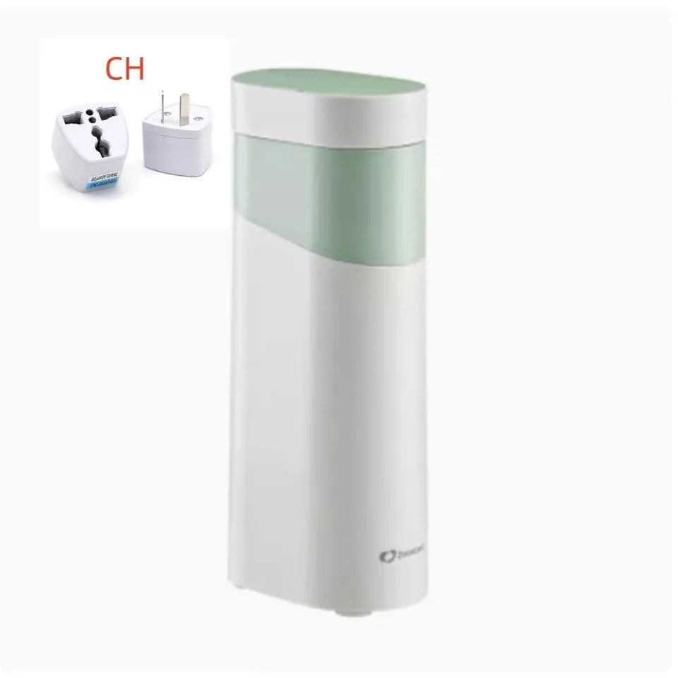 Black or green small instant water dispenser with digital display on a desktop.