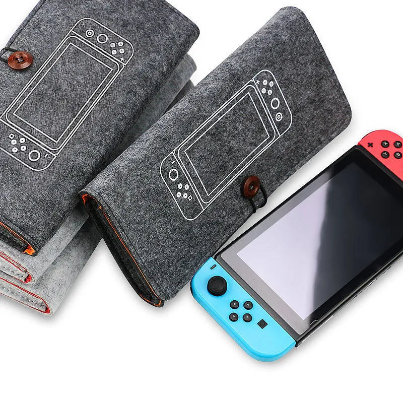 Black felt Nintendo Switch pouch case with double-layer design and game card storage slots