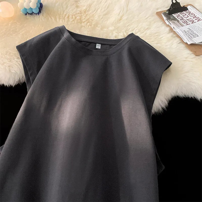 Men's loose solid colour cotton tank top on hanger showing straight hem design