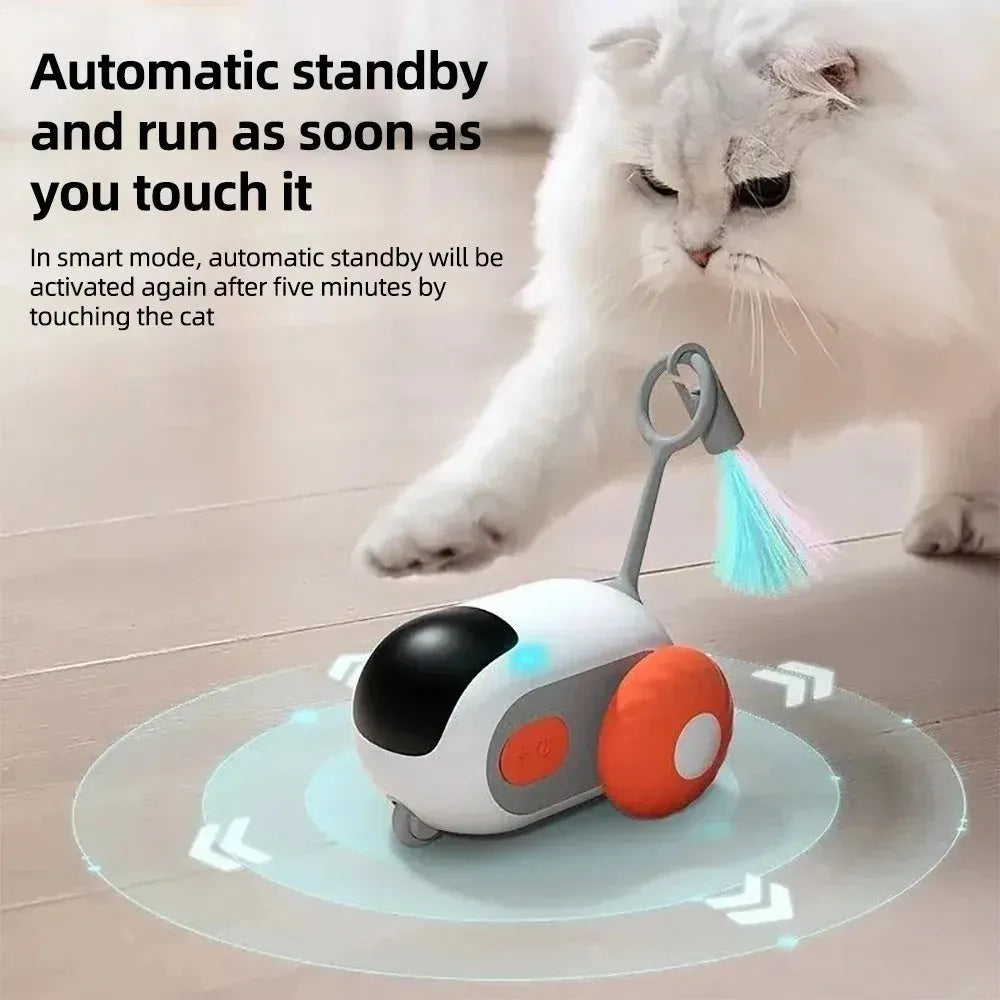 Blue remote control toy car for cats with feather teaser attachment on USB charging cable