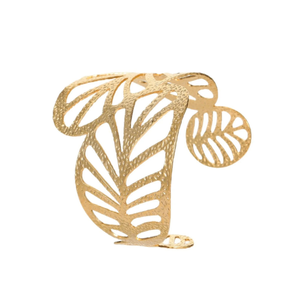 Gold stainless steel wristband with geometric leaf bow design on white background