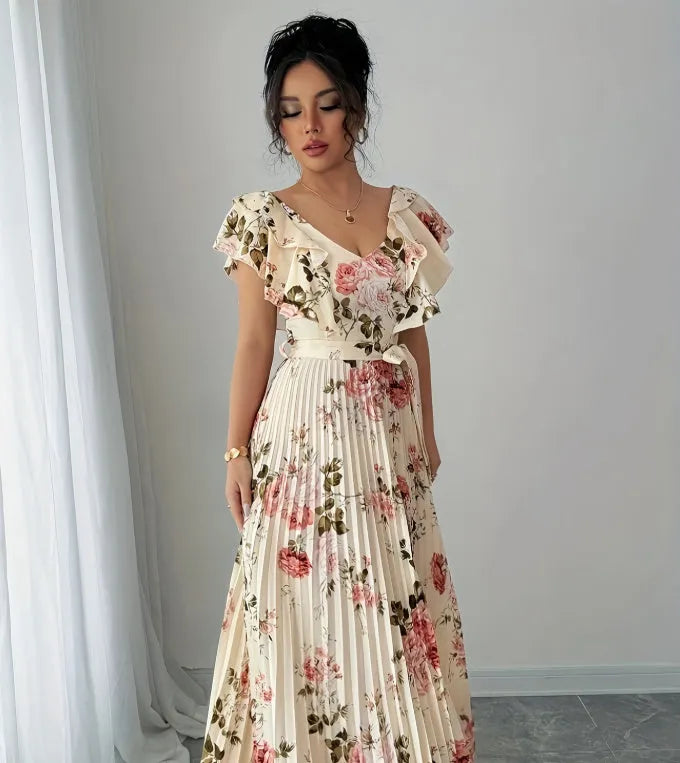Apricot floral print dress with V-neck, ruffled sleeves, and pleated swing skirt