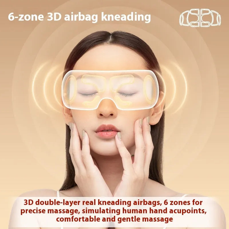 White rechargeable eye massager with airbag massage and hot compress functions on a plain background