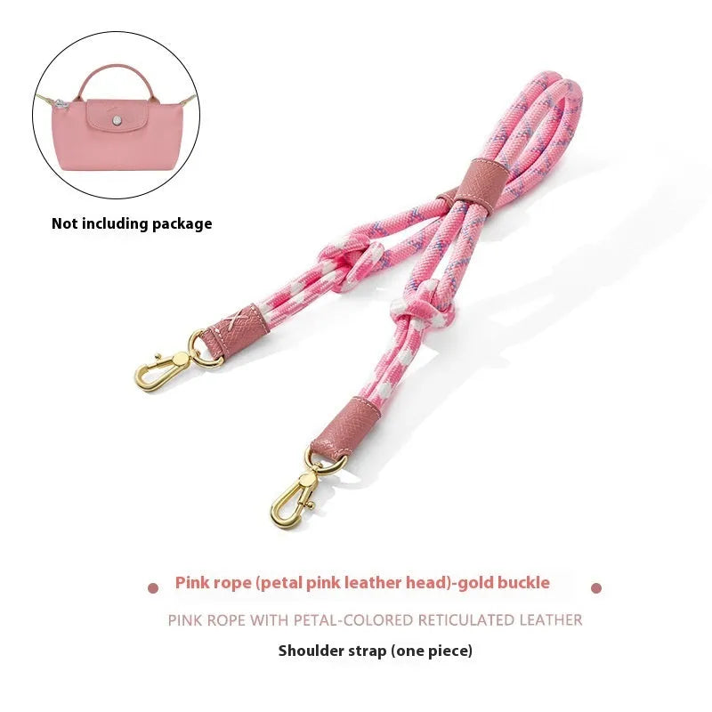 Braided nylon and cowhide leather crossbody shoulder strap with gold alloy buckle on a grey background.