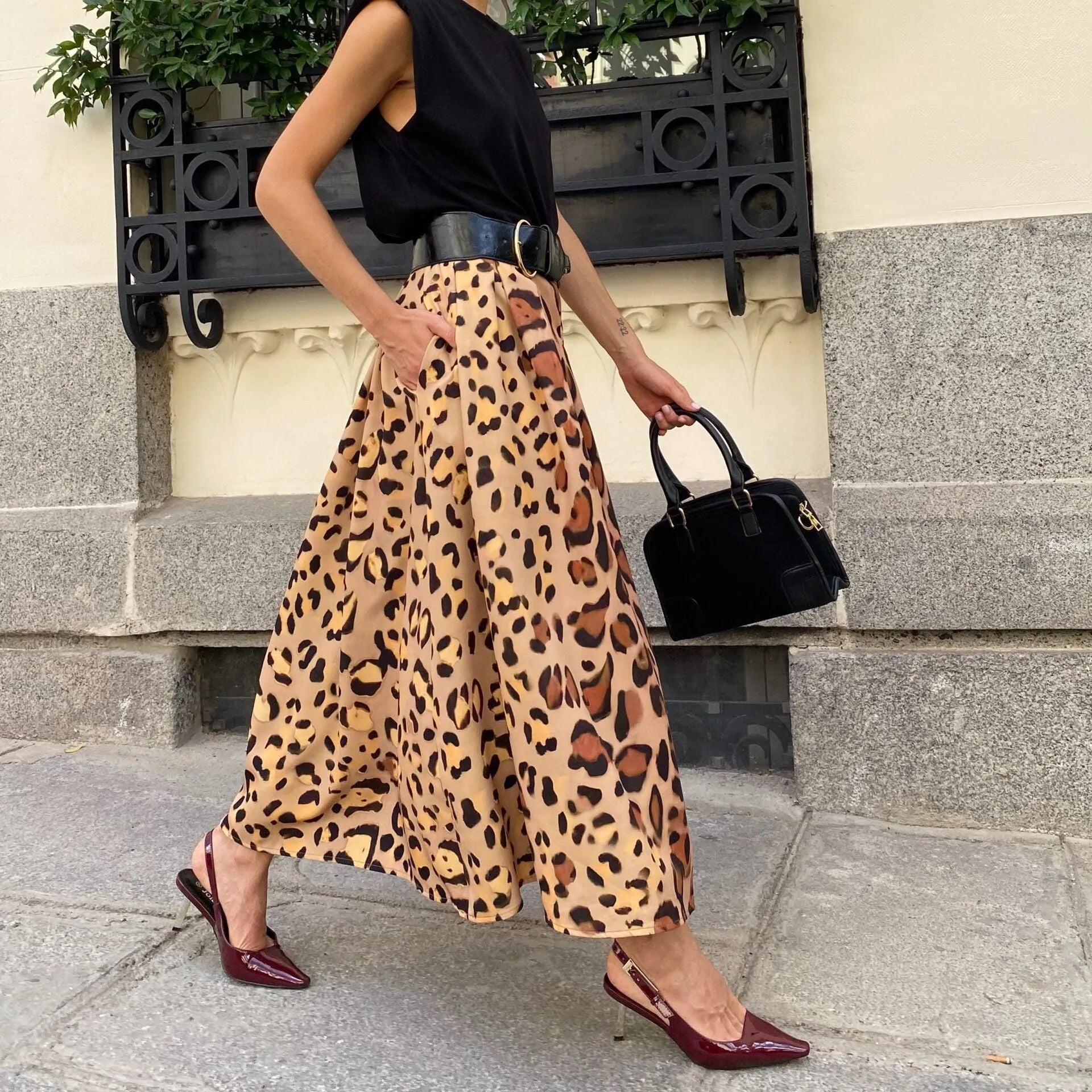 Women's brown leopard print A-line long skirt with big hem detail