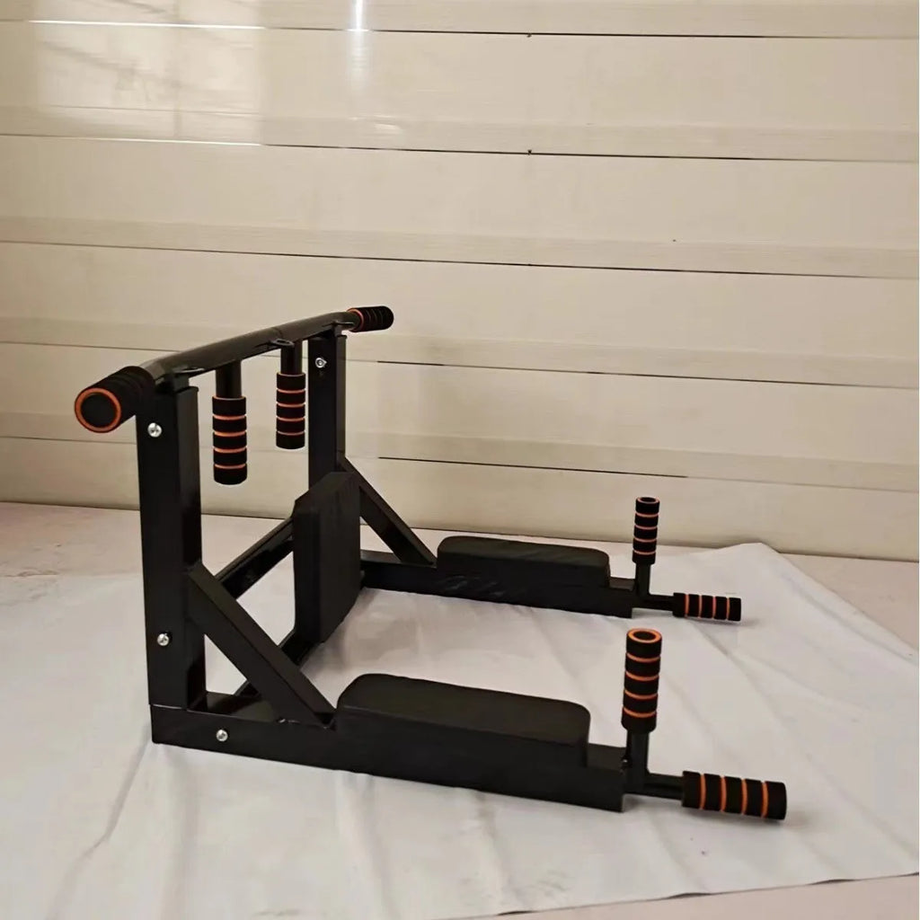 Black wall-mounted metal fitness station with a sandbag rack and single parallel bars for pull-ups