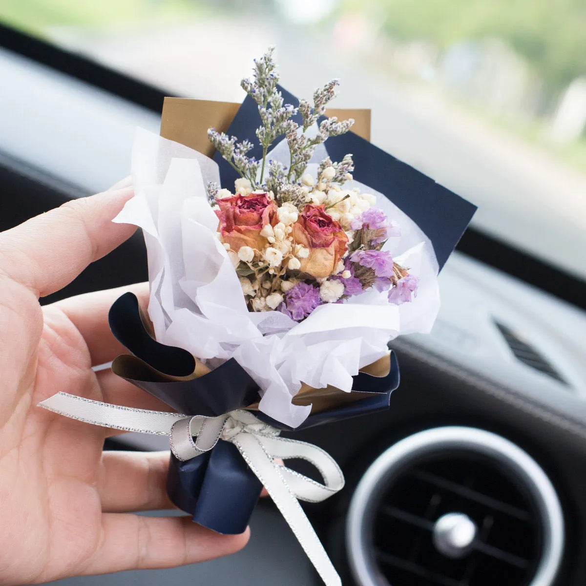 Handmade dried flower car vent ornament with interchangeable scented discs in multiple colour options