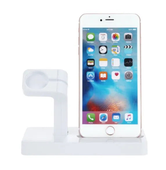 White 2-in-1 charging dock station holding an iPhone and an Apple Watch on a desk.