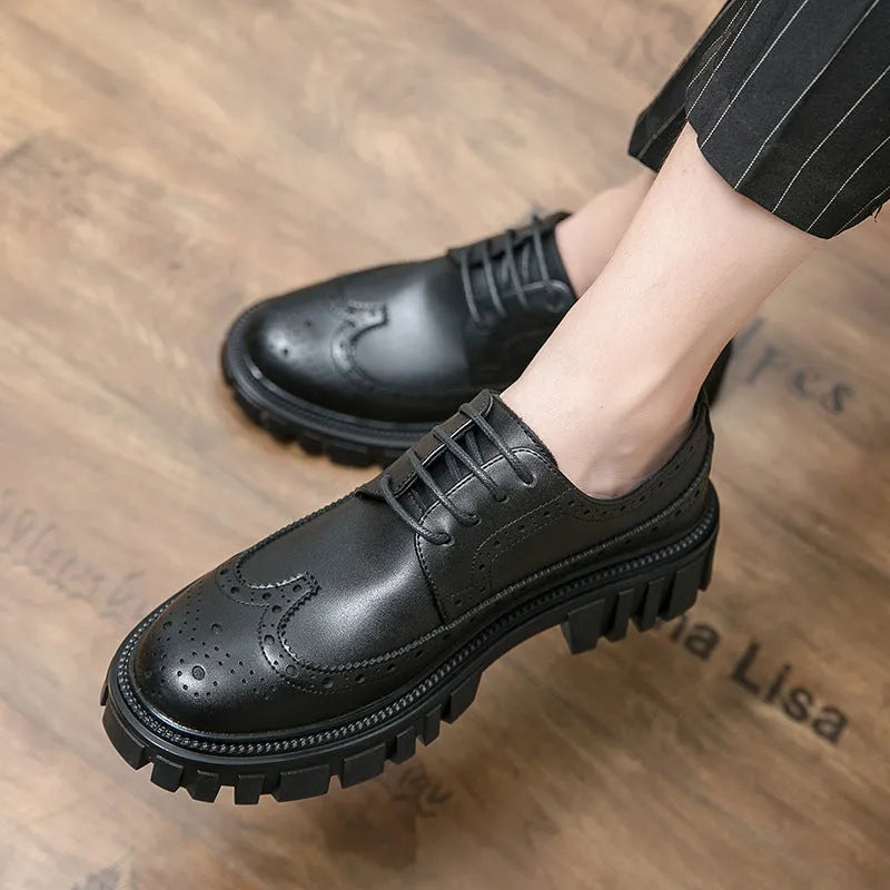 Men's black and brown brogue Oxford shoes with wingtip detailing and round toe