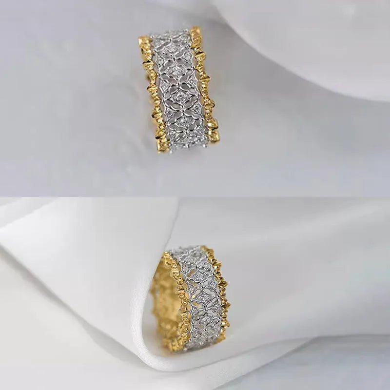 Two-tone gold geometric zircon ring on display showing round shape and electroplated copper construction
