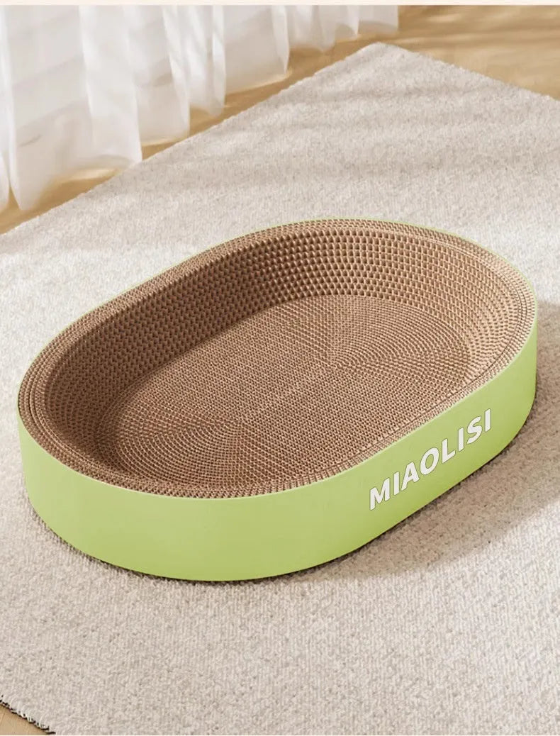 Green oval corrugated paper cat scratch board and nest, 55cm diameter