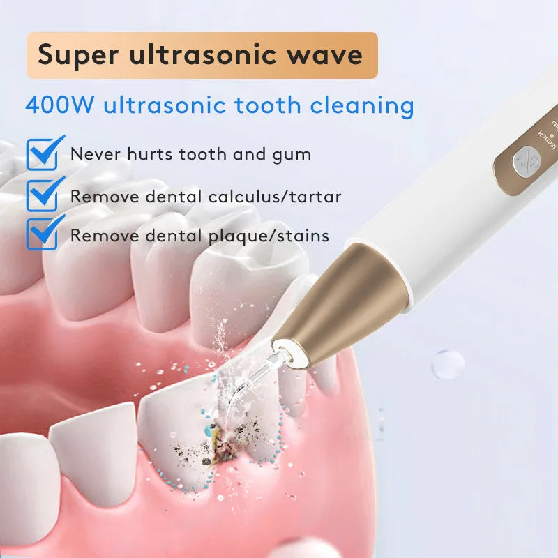 Gold-coloured ultrasonic teeth cleaning device for tartar and stain removal