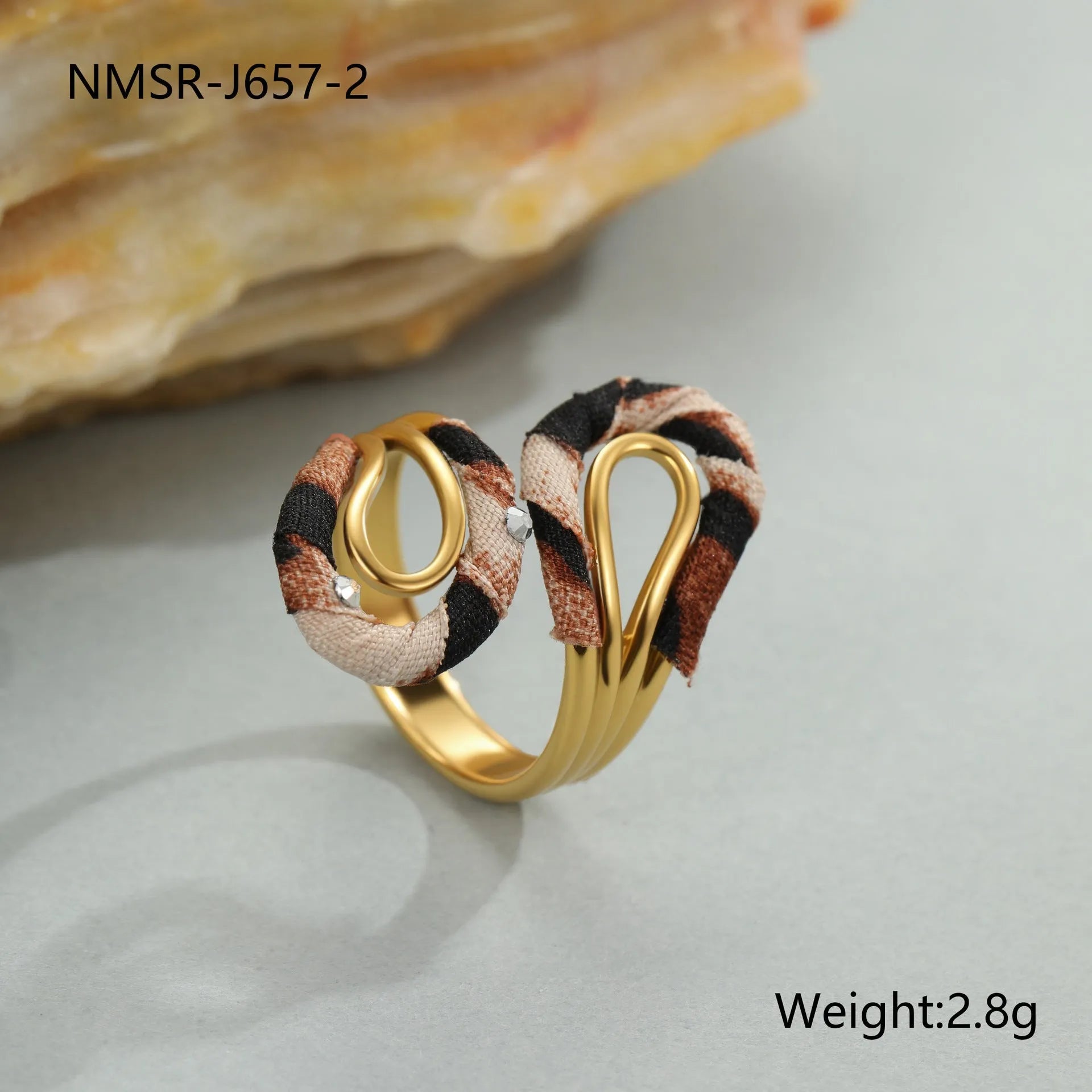 Leopard print geometric open mouth adjustable ring in stainless steel, showing heart shape on finger.
