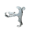 Close-up of alloy archery release aid showing two-axis harpoon clip mechanism with zinc alloy construction