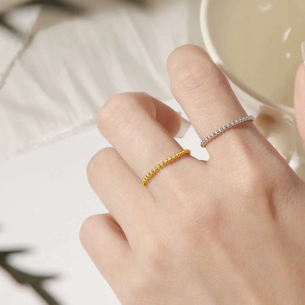 Titanium steel plain circle bead ring in gold colour for women, geometric shape, stackable