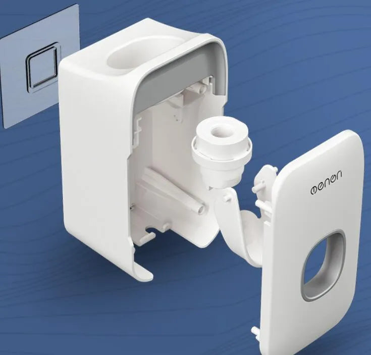 Blue automatic toothpaste dispenser with infrared sensor mounted on a bathroom wall.