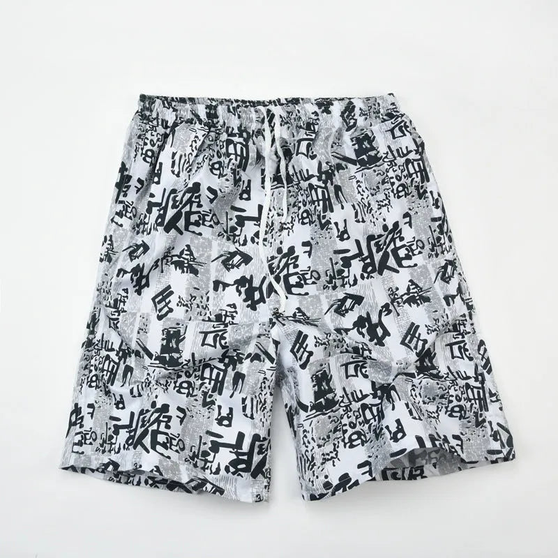 Men's floral printed five-point swimming trunks in free size made of polyester