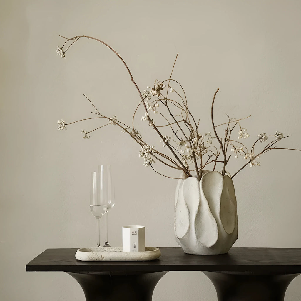 Irregular ceramic vase for flower arrangements in handcrafted design