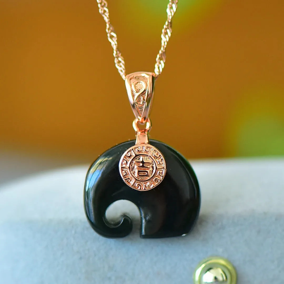 Flat grey Hetian jade pendant with copper wire inlay on an 18-inch chain.