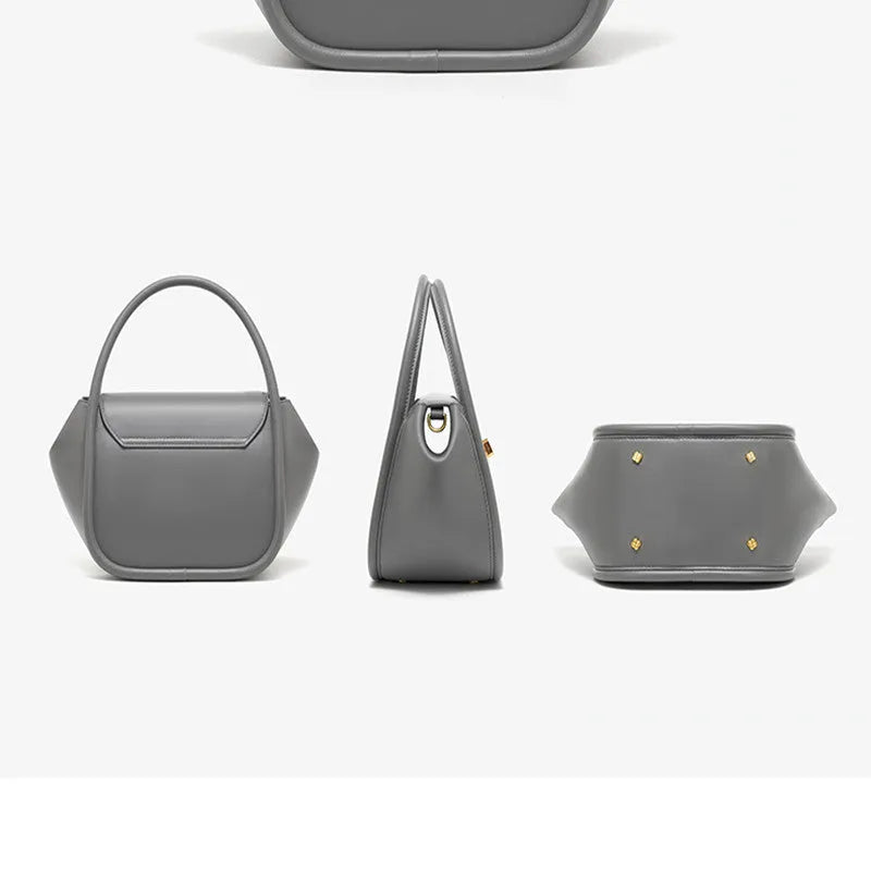 Women's leather wing-shaped tote bag with hard handle and cross-body strap in four colour options