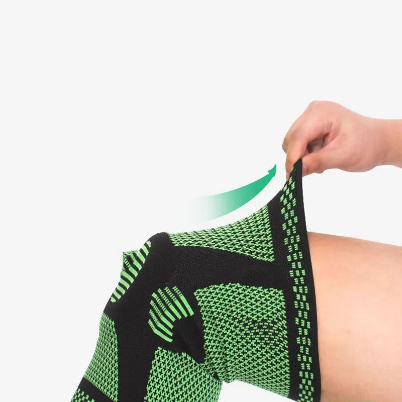 Green silicone spring knee pad shown on a leg, with size options M L XL for leg circumferences 35-55cm.