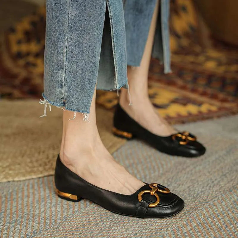Wanwan Lei style women's pumps with shallow mouth design, square toe, and metallic flat shoe appearance