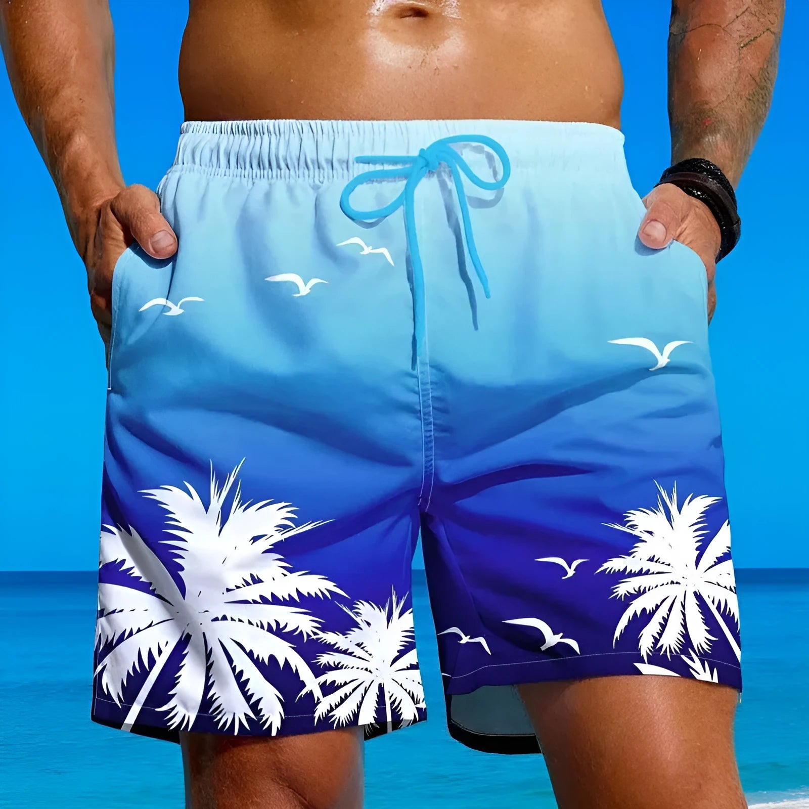 Men's loose board shorts in ethnic pattern with medium elastic waistband