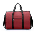 Medium cylinder travel bag in black with Oxford cloth water-resistant material and zipper opening