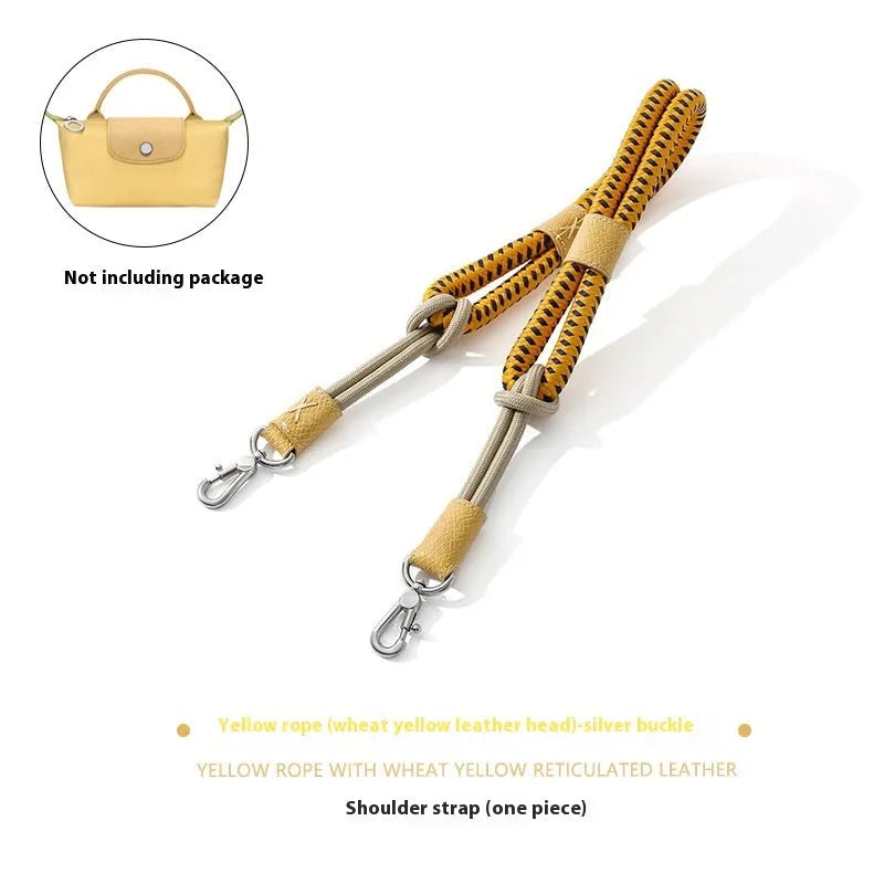 Braided nylon and cowhide leather crossbody shoulder strap with gold alloy buckle on a grey background.