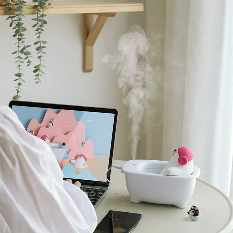 White Creative Air Humidifier with USB cable and 550ml water tank on a desk