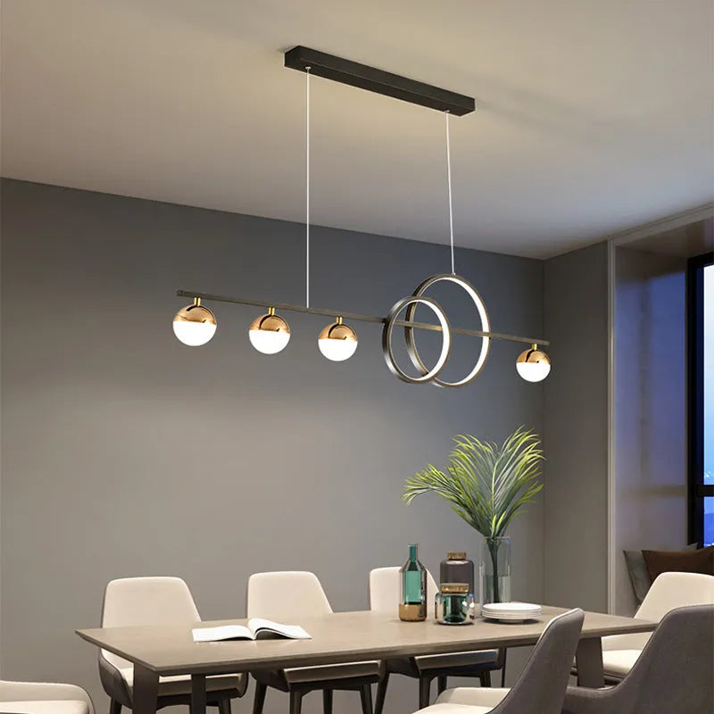 Rectangular aluminium ceiling light in black or gold finish with remote dimming, shown in 80cm, 95cm, and 120cm sizes.